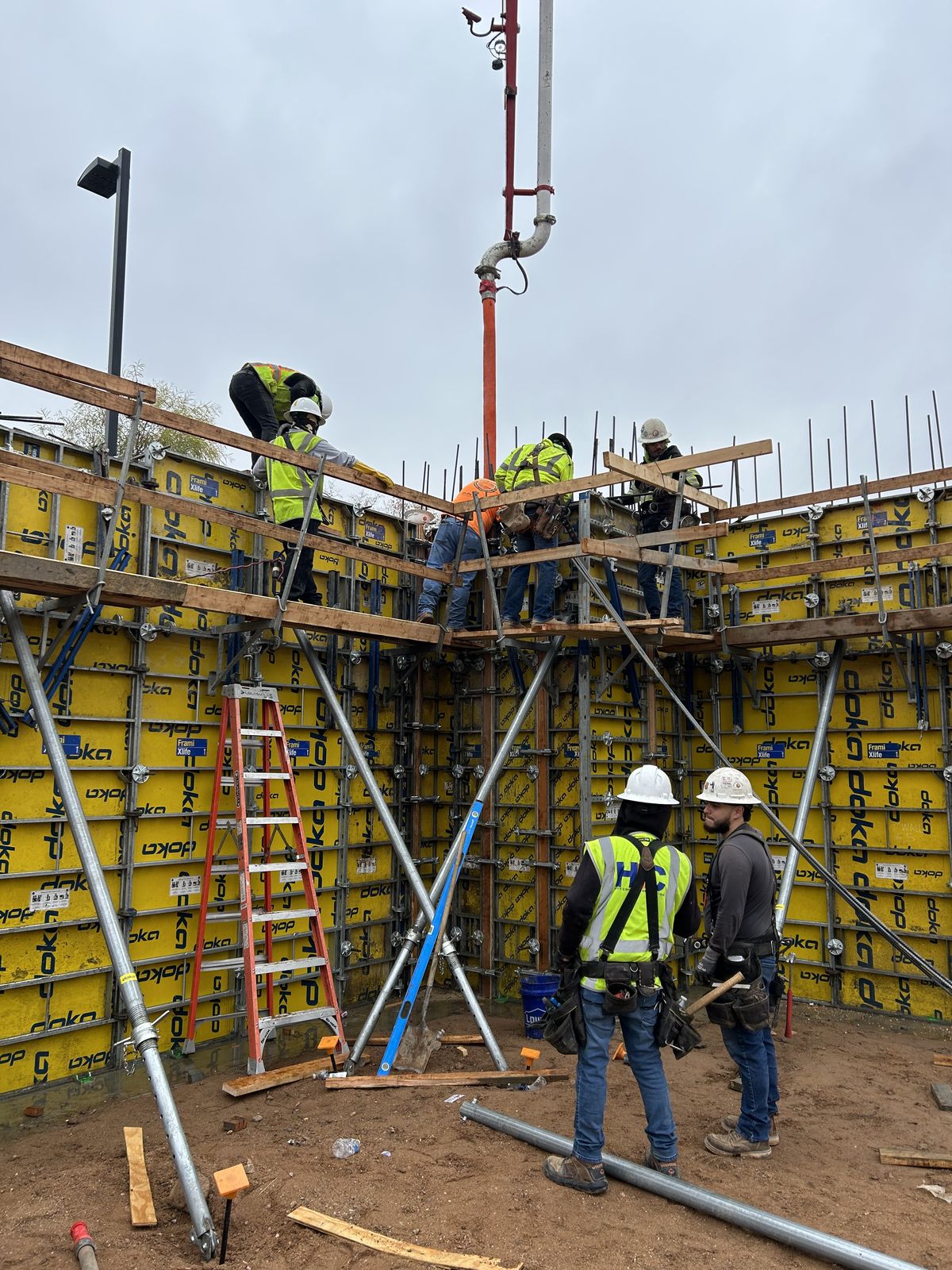 Hoyt Concrete crew building wall formwork on a commercial job site